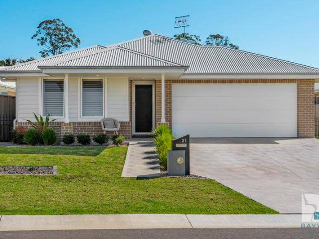 Coastal Living at Its Finest in the Sought After Sussex Inlet Golf Village