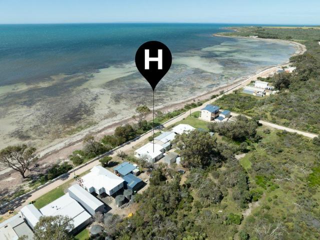 Coastal Living at Its Finest Just Steps from the Beach!