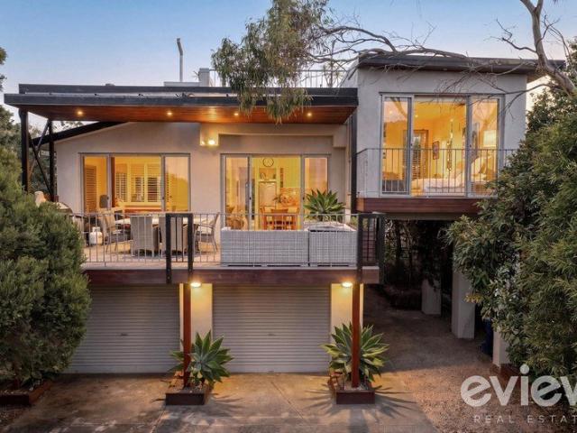 Coastal Living at its Finest Steps from the Beach with Stunning Sea Views