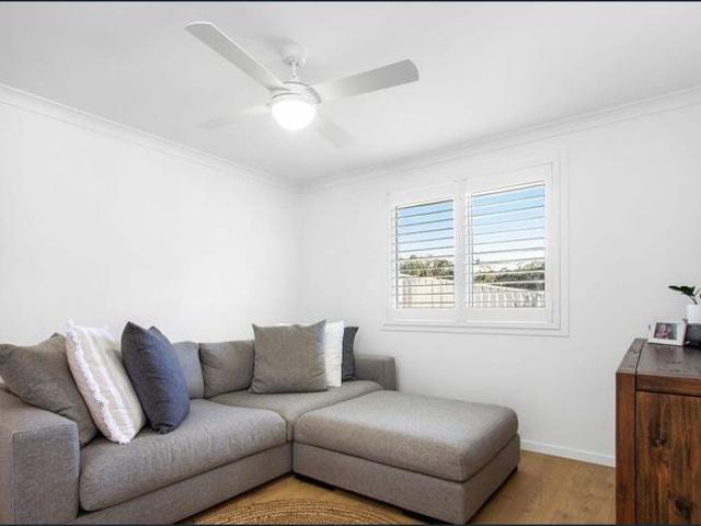 Coastal Living at Its Finest – Stylish 4 Bedroom Home Near the Beach