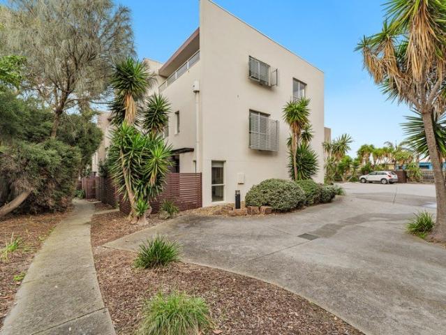 Coastal Living at Its Finest Spacious 3 Bedroom Townhouse Opposite the Beach