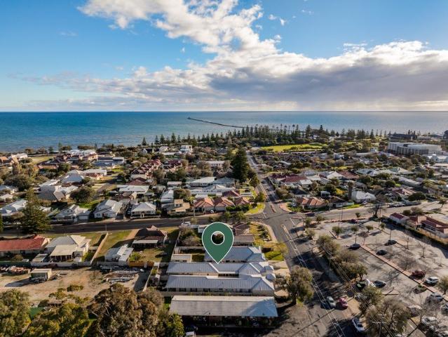 Coastal living at its finest walk to beach & town