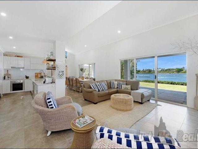 Coastal Living – Fully Furnished Family Home with Stunning Water Views
