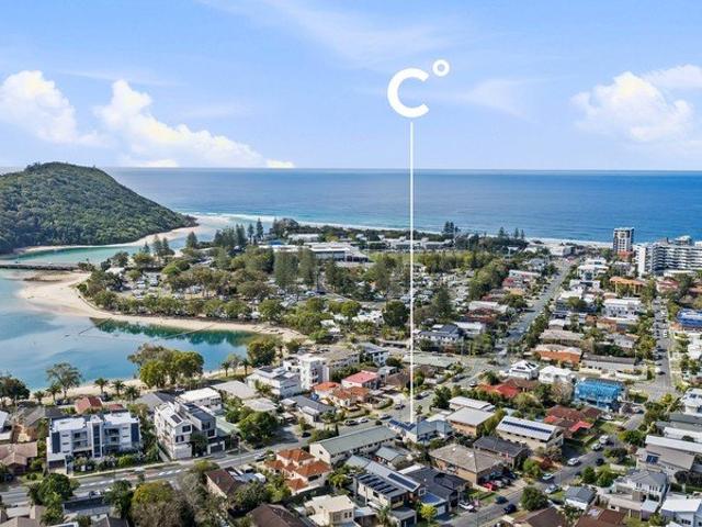 COASTAL LIVING IN THE HEART OF PALM BEACH