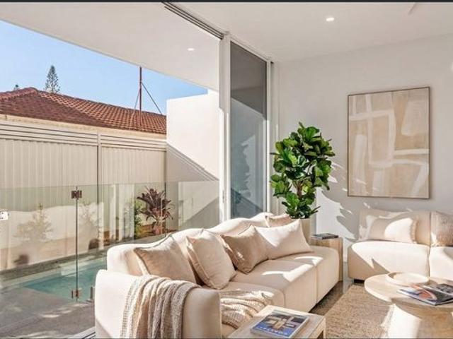 Coastal Living in the Heart of Palm Beach Just Moments from the Beach
