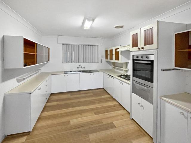 Coastal Living in Sought After Palm Beach