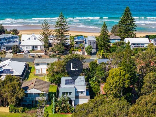 Coastal Living Just Steps from the Sand