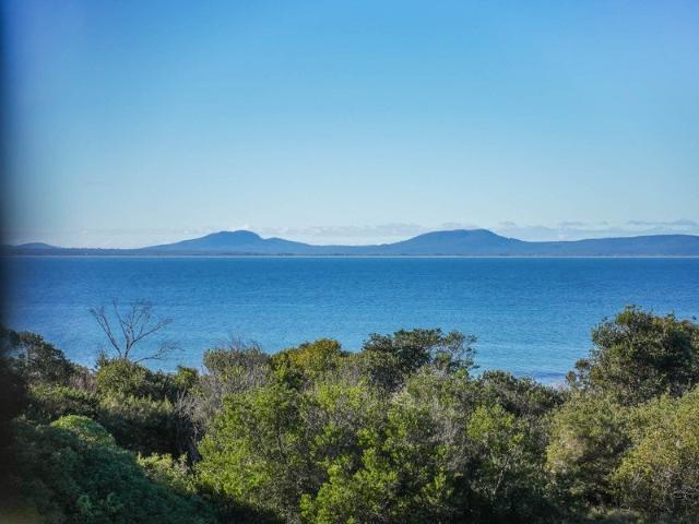 Coastal Purity with Beach Frontage