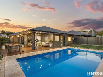 Coastal style, family space & a resort backyard made for entertaining