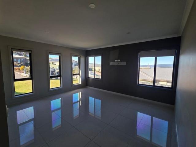Coastal Sanctuary with Exceptional Shedding & Panoramic Views $800 Per week