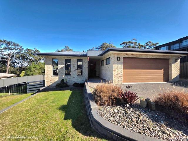 Coastal Sanctuary with Exceptional Shedding & Panoramic Views $800 Per week