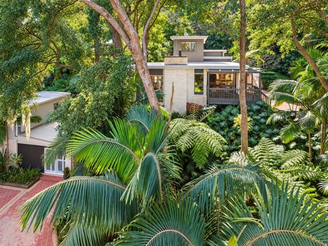 Coastal Sanctuary in Tranquil Rainforest Setting