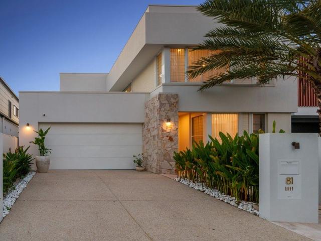 Coastal Sophistication Meets Exclusive Lakefront Living