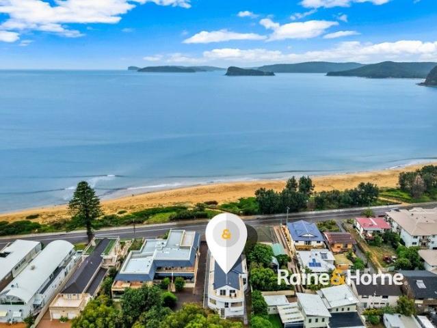 Coastal Views, Space & Privacy A Rare Two Level Beachside Apartment