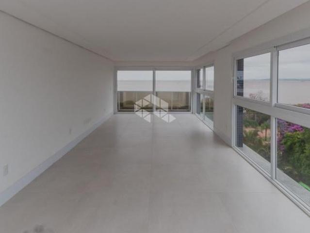 Cobertura de 3 suítes, 3 garagens, piscina, enfrente ao Guaíba