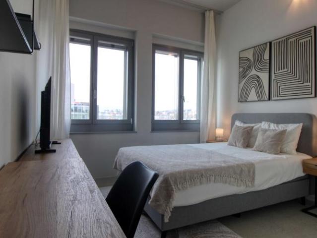 Coliving Moderne Alliant Intimité, Travail et Vie Partagée à Renens