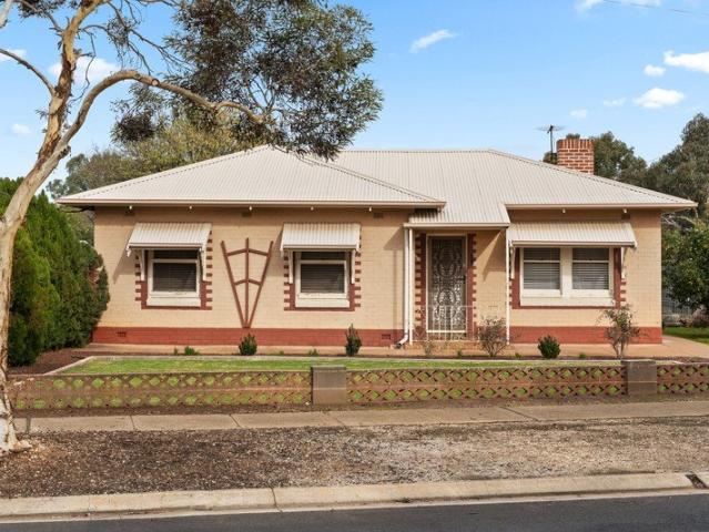 Corner Block Comfort with Modern Updates!