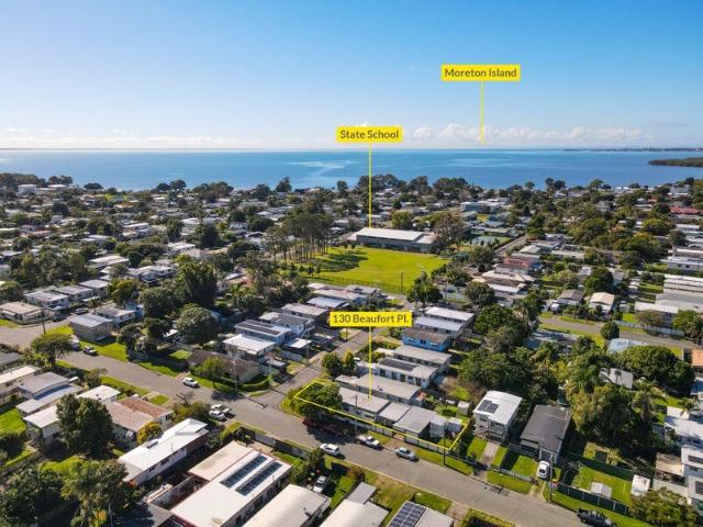 Corner Block Opportunity with Endless Potential Walk to the Waterfront!