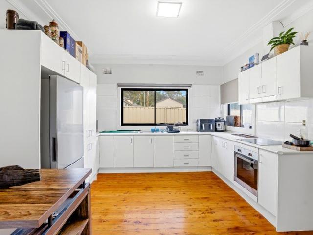 Corner Block Opportunity with Spacious Living and Endless Potential