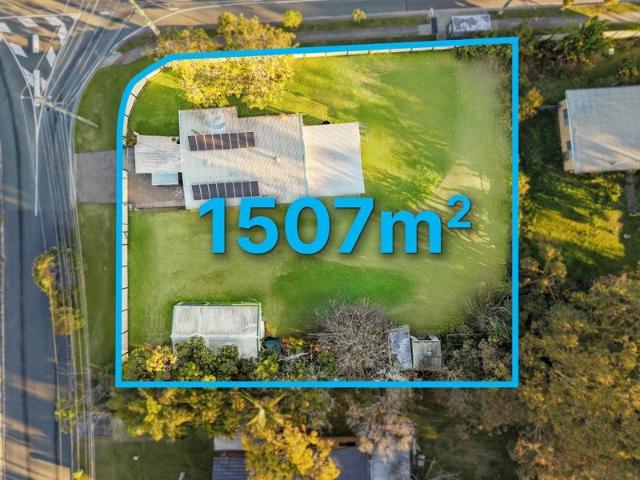 CORNER BLOCK WITH DEVELOPMENT POTENTIAL!
