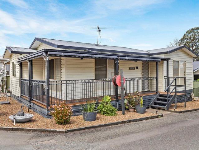 CORNER RETREAT WITH WRAP AROUND VERANDA