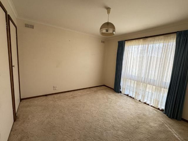Cosy Three Bedroom Brick Home