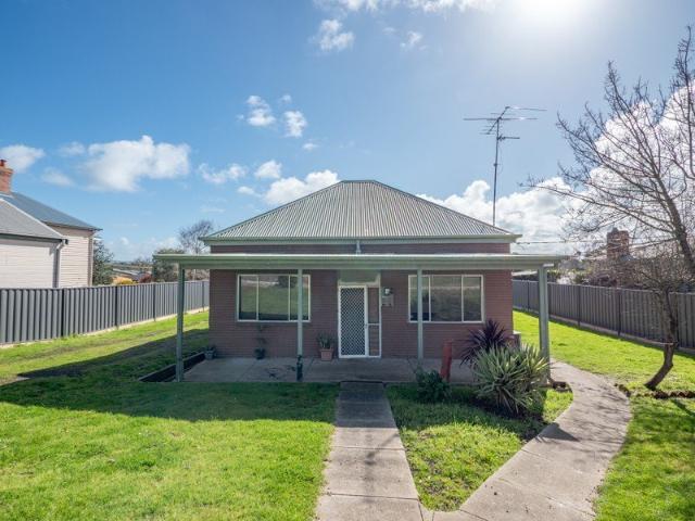 Cottage on 1/4 Acre with Development Potential
