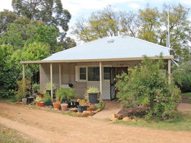 COTTAGE CHARM WITH FUTURE POSSIBILITIES