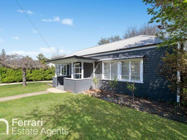 Cottage Charm with Modern Appeal on Large Block