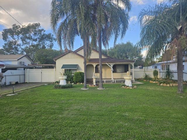 Cottage close to hospital and school Live in or Invest
