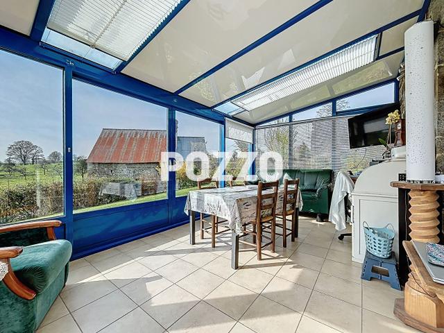 COULOUVRAY BOISBENATRE, charmante maison en pierres avec véranda. DPE: C