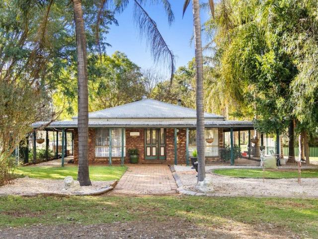 Country Character & Creek Frontage on 3.92 Acres