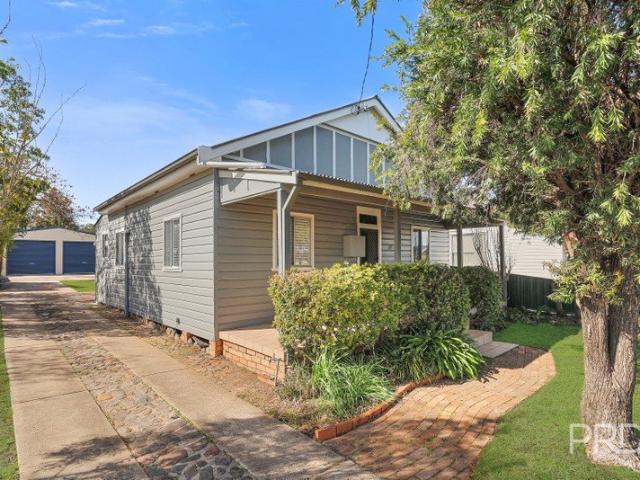 Country Cottage Charm and a Shed You'll Love!