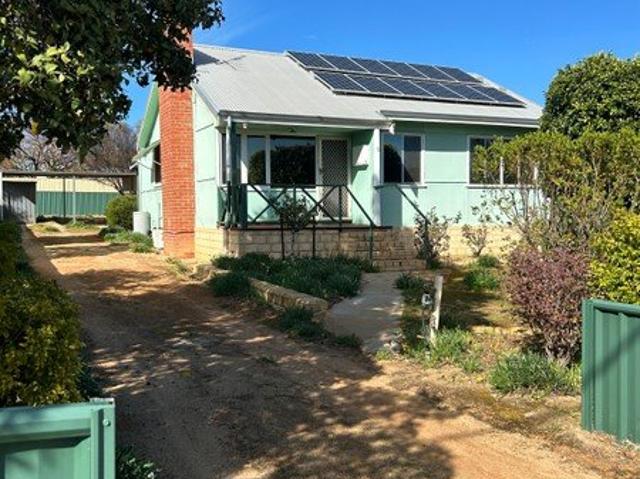 COUNTRY HOME ON SPACIOUS BLOCK