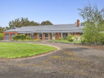 Country Inspired Family Living on 2 Acres Close To Town