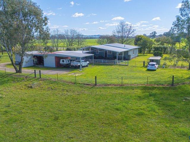 Country Lifestyle on 2.4 Acres with Spacious Shedding