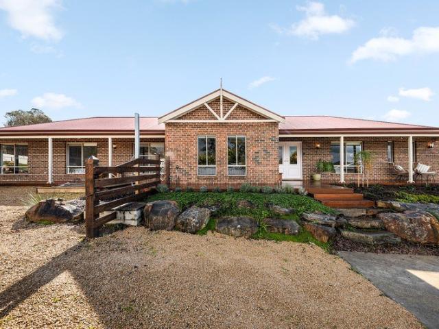 Country living at its finest. a grand, spacious & modern family homestead