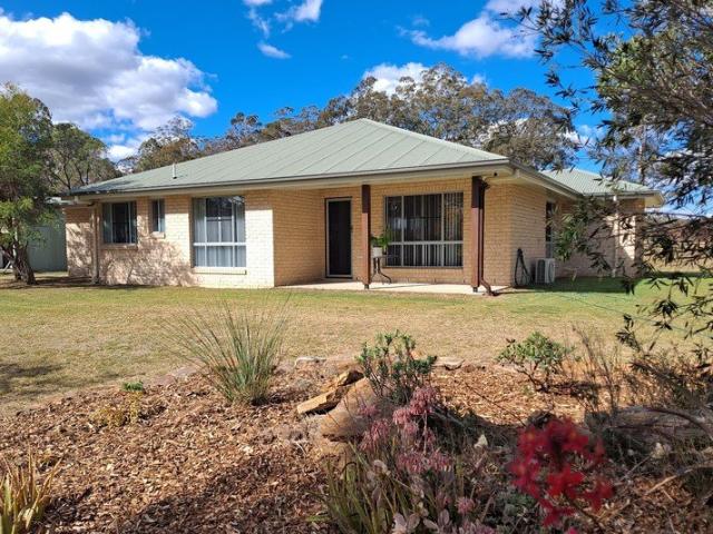 Country Living on 5 Acres with Elevated Views, Sheds & Space