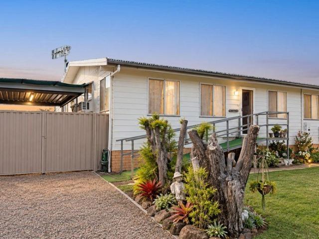 Country Town Comfort with a Generous Yard, Big Shed & Great Location