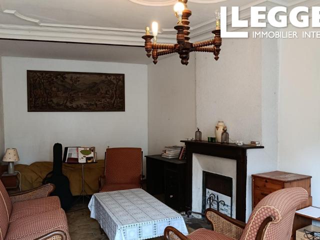 Country 2 bedroom house located in a historic hamlet with attached barns