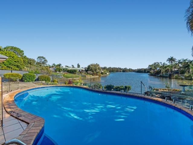 Coveted North Facing Wide Water Opportunity with Endless Potential