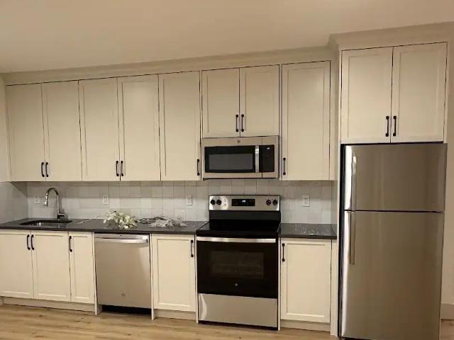 Cozy one bedroom legal suite with a separate entrance and a dedicated furnace