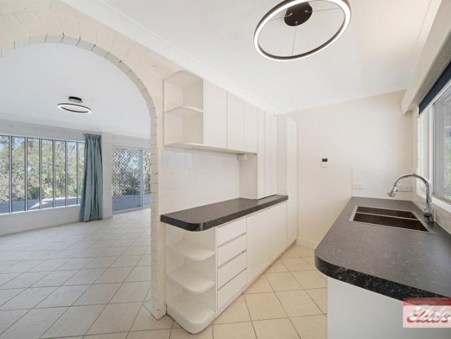 Cozy Bush side Townhouse! With an Expansive Deck Area!