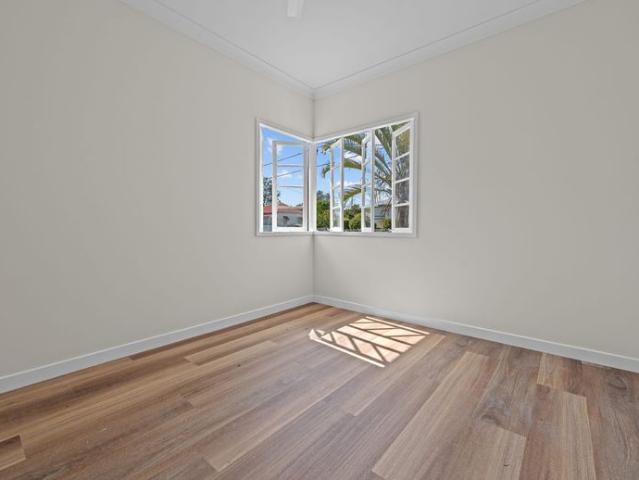 Cozy Booval Charmer with Big Yard & Everyday Convenience