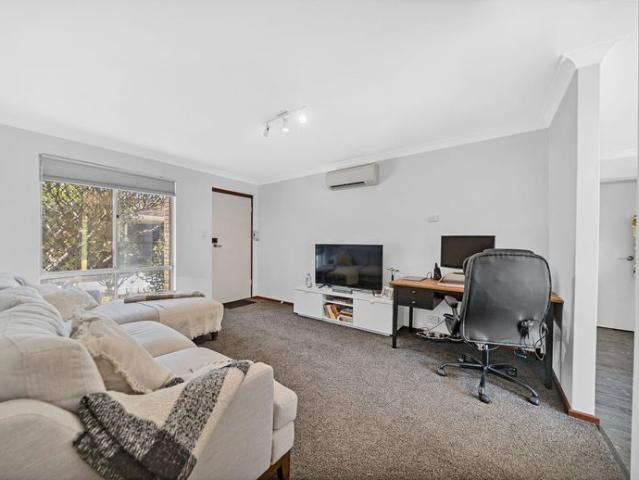 Cozy Low Maintenance Living in Prime Location