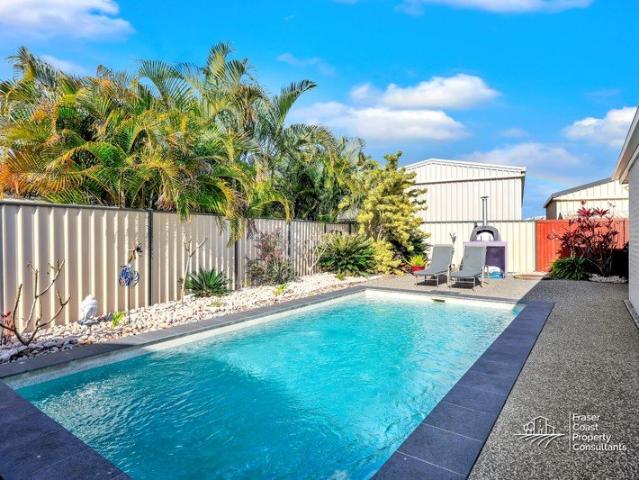 COZY SEASIDE SANCTUARY PERFECTLY DESIGNED FOR EFFORTLESS LIVING!