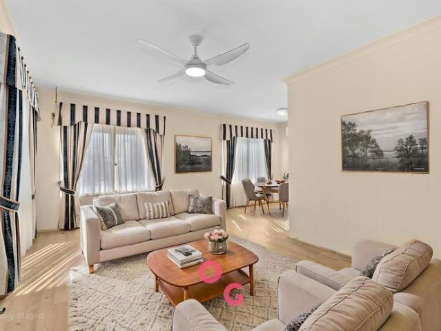 Cozy Three Bedroom Home with Central Convenience
