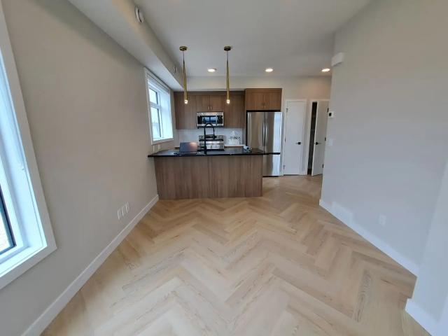 1 Bed 1 Bath Townhome with Assigned Outdoor Parking Stall in Seton