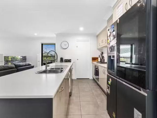 Nice 31 Varsity Crescent, NORMAN GARDENS, QLD 4701 House for.