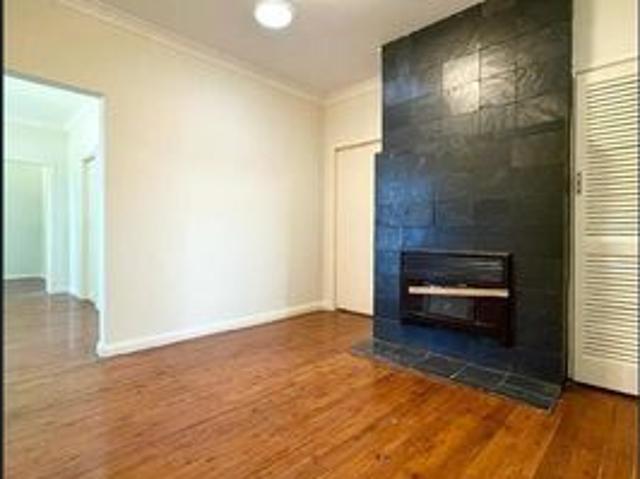 Cozy 3 Bedroom Home with Spacious Front Yard